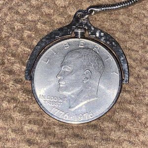 1976-P Bicentennial Eisenhower $1 in a coin holder for a key chain.